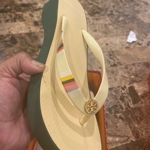 Tory Burch multi colored flip flops